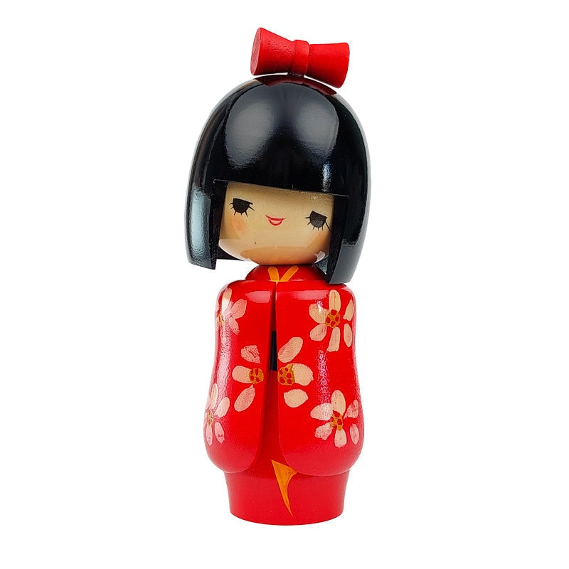 Een set van zeven vintage traditionele Japanse kokeshi Een set van zeven vintage traditionele Japanse kokeshi