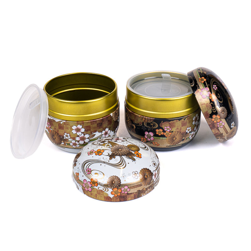 Set van Twee Metalen Theeblikken - Zwart & Wit
