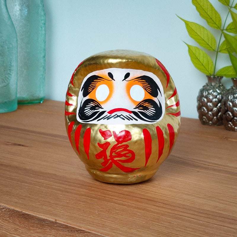 Grote gouden daruma