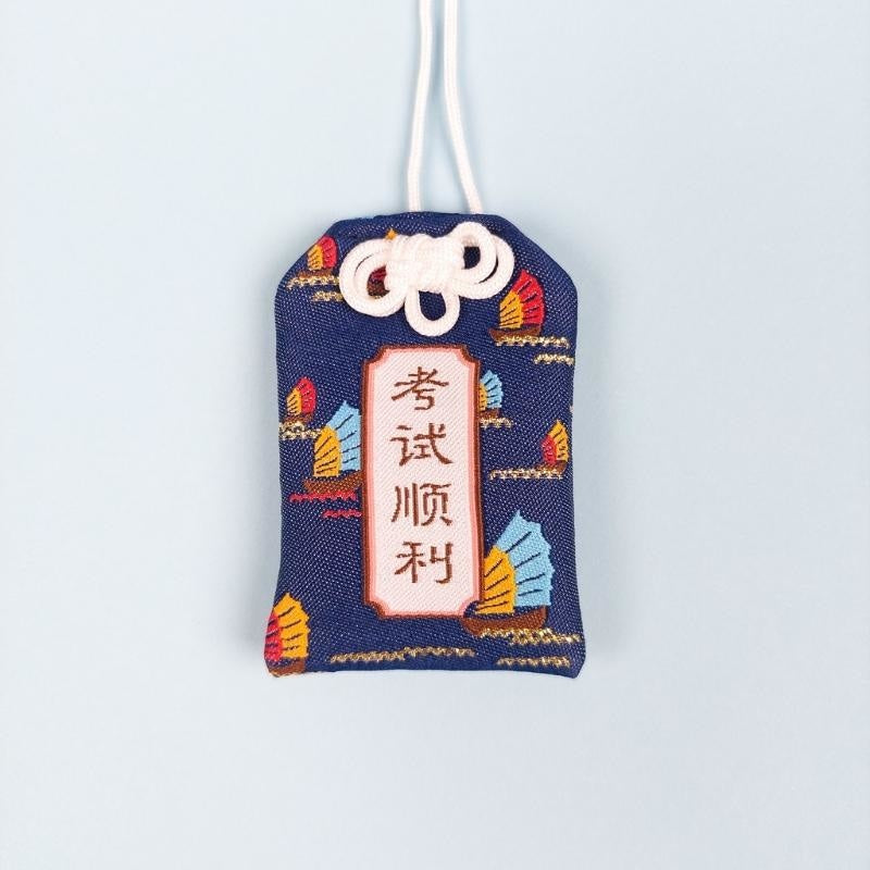 Omamori geslaagd examen