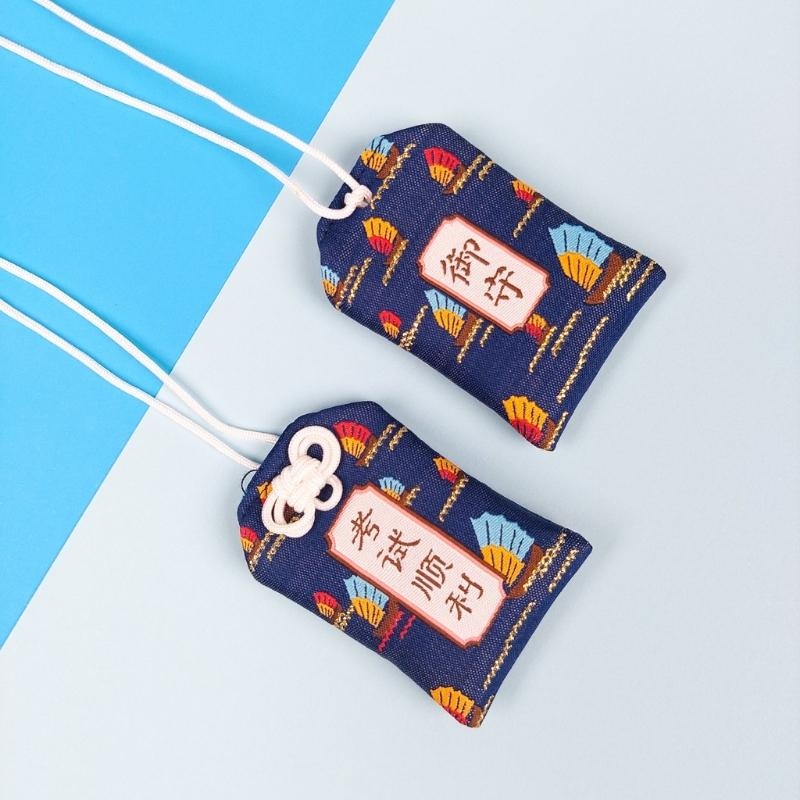Omamori - Slagen voor Examen