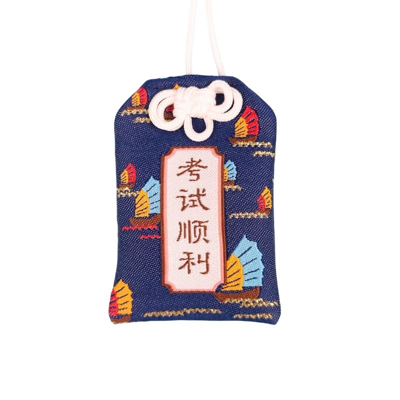 Omamori - Slagen voor Examen